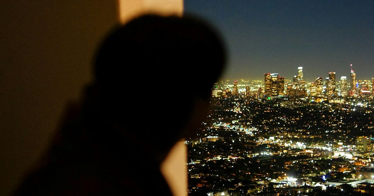 Woman looking over city